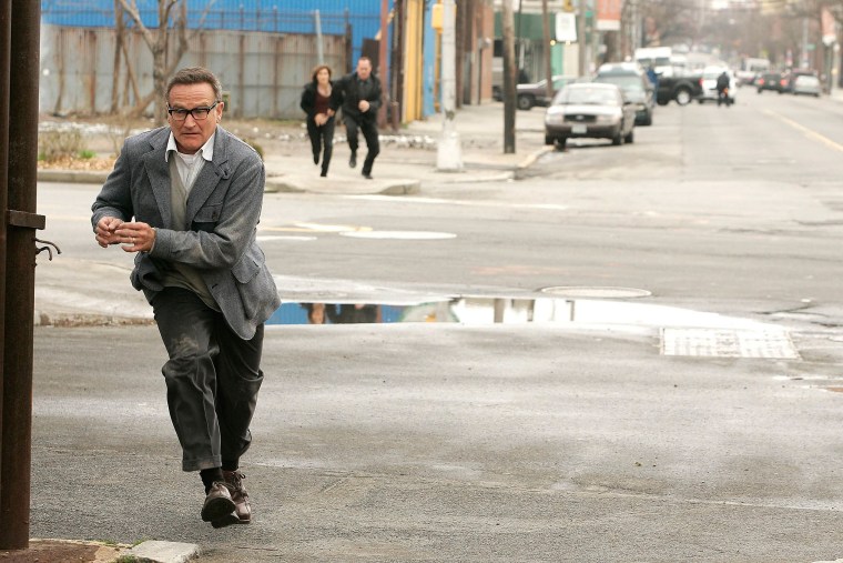 Robin Williams, Mariska Hargitay, and Christopher Meloni filming a scene of 'Law & Order' on April 01, 2008 in New York City. 