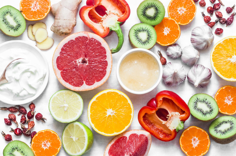 Immunity boosting foods on white background.