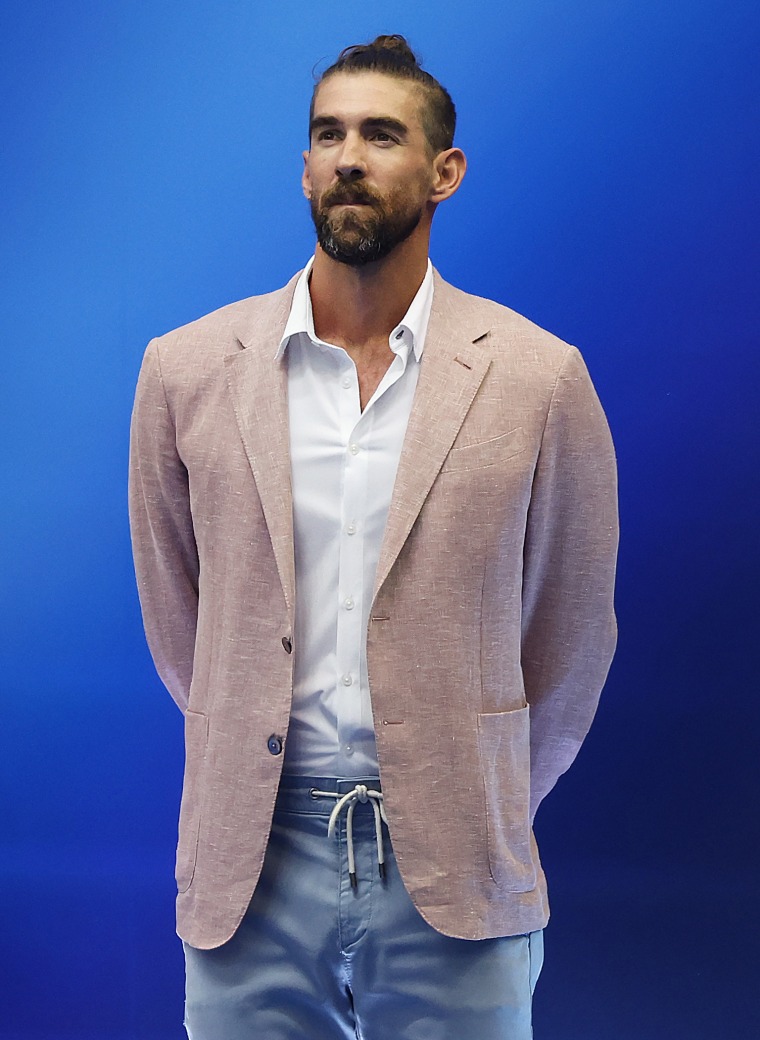 Michael Phelps on blue background.