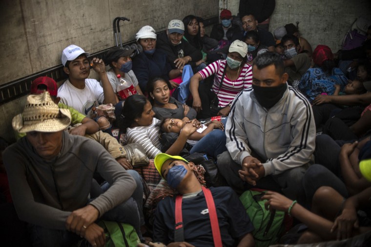 Central American migrants - mostly from Honduras - travel in a truck from Mexicali to Tijuana, Mexico, on November 27, 2018.