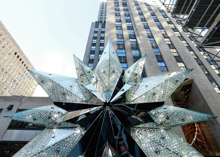 Swarovski Star Raising For 2013 Rockefeller Center Christmas Tree
