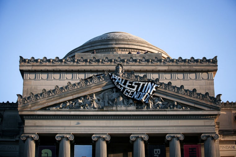 A banner hangs from the Brooklyn Museum.