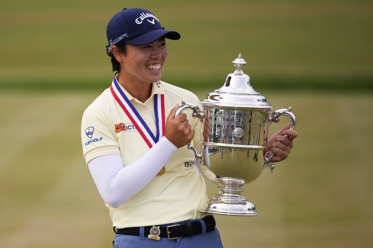 Yuka Saso holds the tournament trophy after winning the U.S. Women's Open golf tournament in Lancaster, Penn., on June 2, 2024.