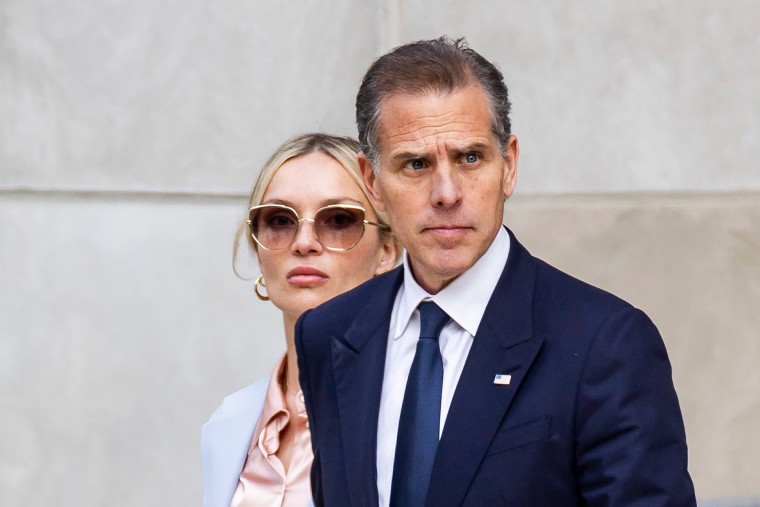 Hunter Biden and his wife Melissa Cohen Biden walking