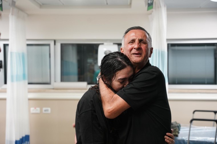 Noa Argamani is embraced by her father, Yaakov