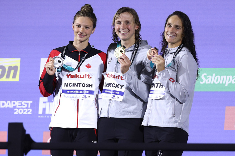 From left, Summer McIntosh, Katie Ledecky, and Leah Smith during a medal ceremony during the Budapest 2022 FINA World Championships in Budapest, Hungary