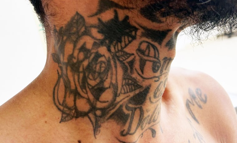 Tattoos on the neck of a man the U.S. Border Patrol arrested in May. It says the man is affiliated with the Venezuela-based gang Tren de Aragua.