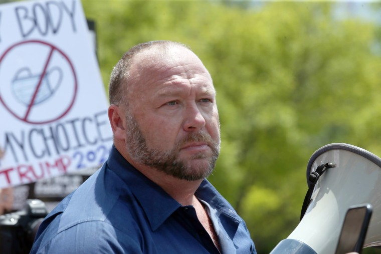 Alex Jones speaks to protestors gathered outside the Texas State Capitol during a rally in Austin, Texas