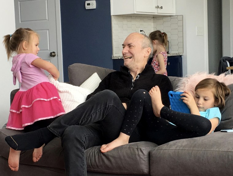 Douglas Roach plays with his grandchildren after he was diagnosed with lung cancer in 2017.