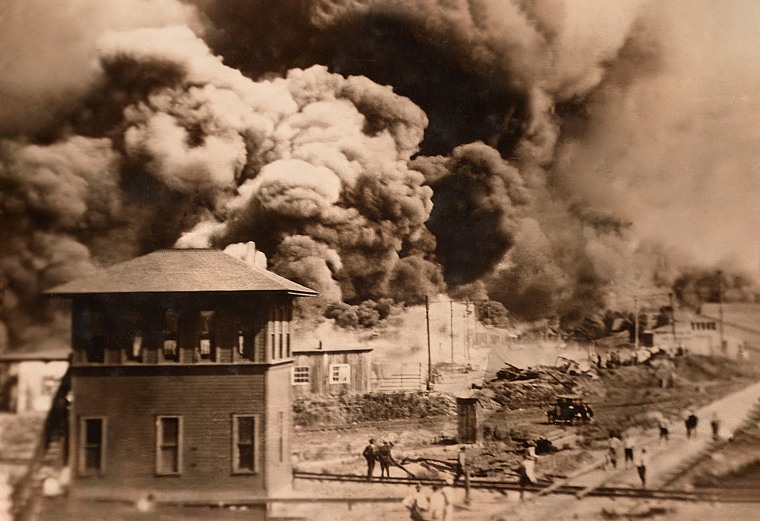 Smoke billows from burning buildings in Tulsa,