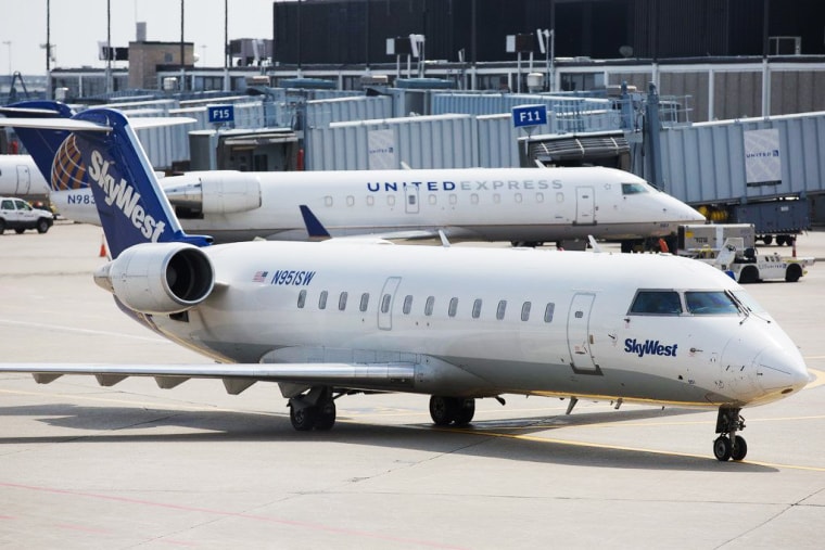 SkyWest and United Express planes on the tarmac.
