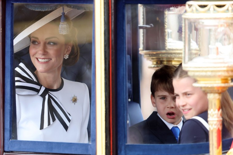 Kate, Princess of Wales, Prince Louis of Wales and Princess Charlotte of Wales during Trooping the Colour at Buckingham Palace on June 15, 2024 in London, England. 