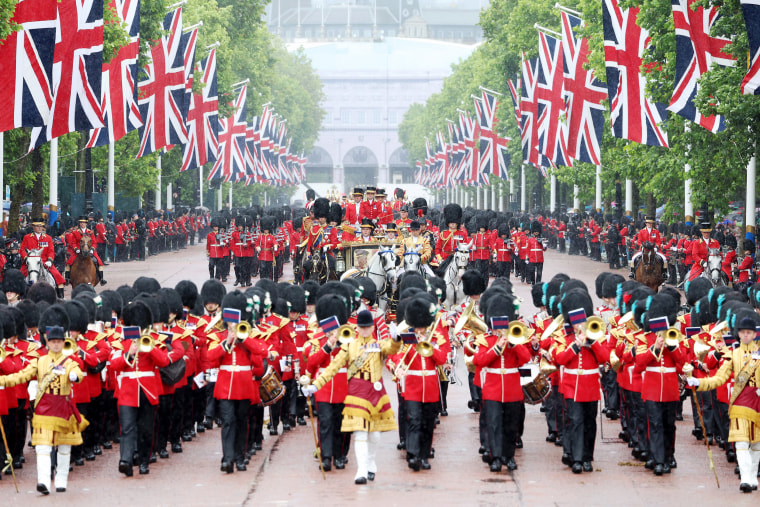Trooping the Colour is a ceremonial parade celebrating the official birthday of the British Monarch. The event features over 1,400 soldiers and officers, accompanied by 200 horses. More than 400 musicians from ten different bands and Corps of Drums march and perform in perfect harmony.
