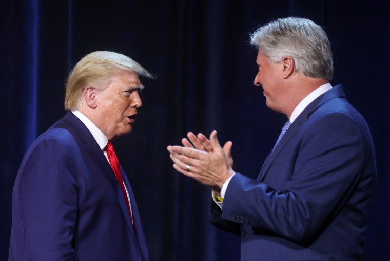 President Donald Trump is greeted by Pastor Robert Morris at Gateway Church