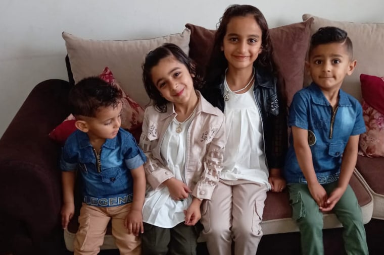 Saher Esleih's children, from left, Tawfiq, Maram, Shireen, and Waleed. Esleih says her two daughters were killed by an Israeli strike in March 2022. Waleed died of cancer in 2022.