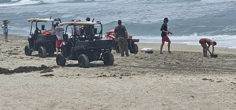 A Pennsylvania couple vacationing in Florida with their six children drowned after getting caught by a rip current while swimming, authorities said.