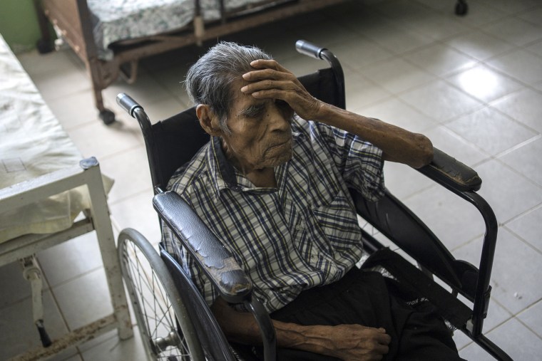 A man holds gestures at the Cogra nursing home amid high temperatures in Veracruz, Mexico