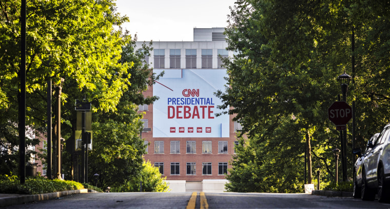 Banners are placed outside of CNN studios ahead of the first presidential debate in Atlanta.