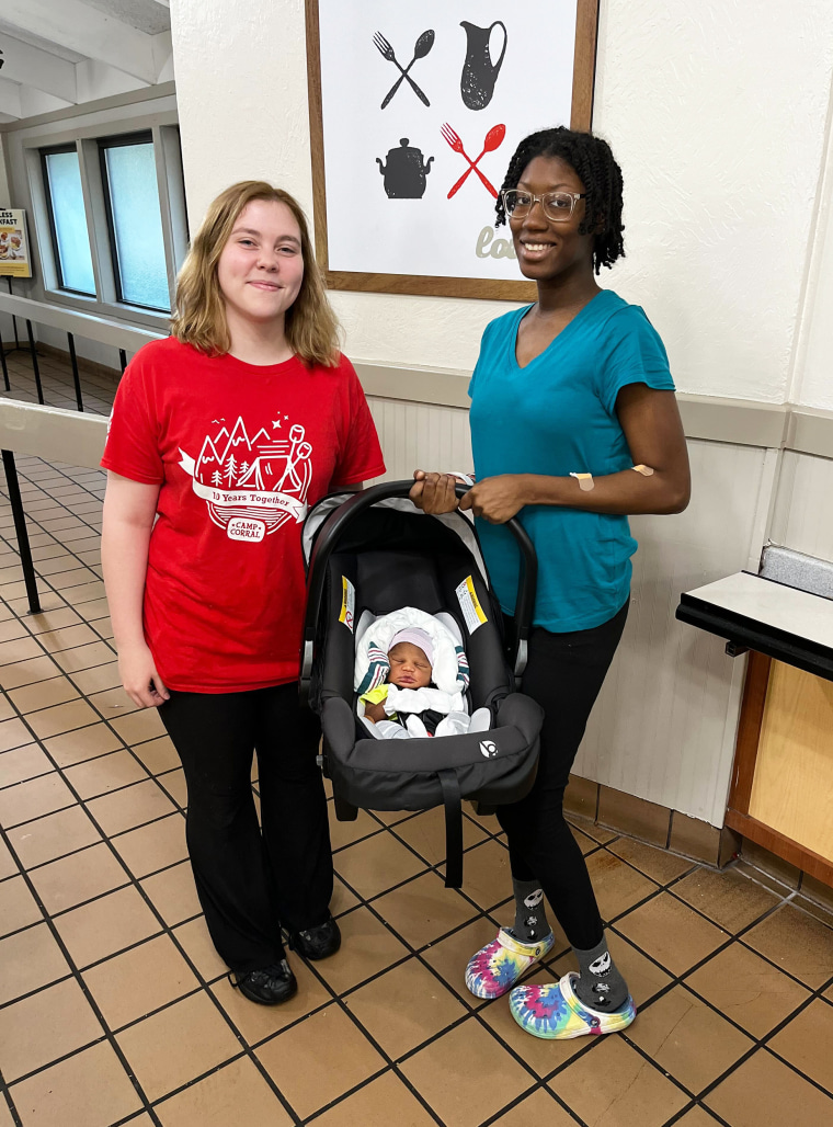 Tayvia Woodfork, right, returned to Golden Corral with her son who was born there on May 6. 