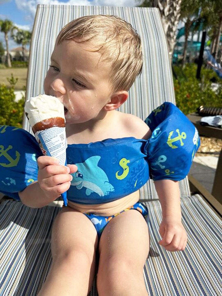The pool water will wash that ice cream right off Rome Gracey's adorable little face.
