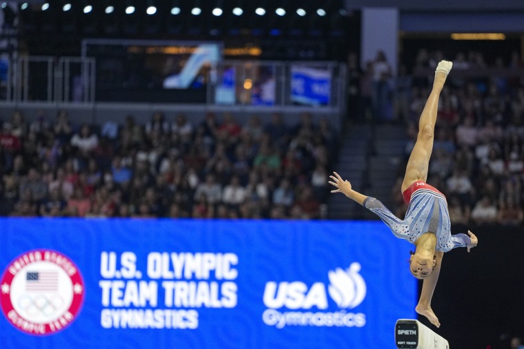 Hezly Rivera competes on the balance beam