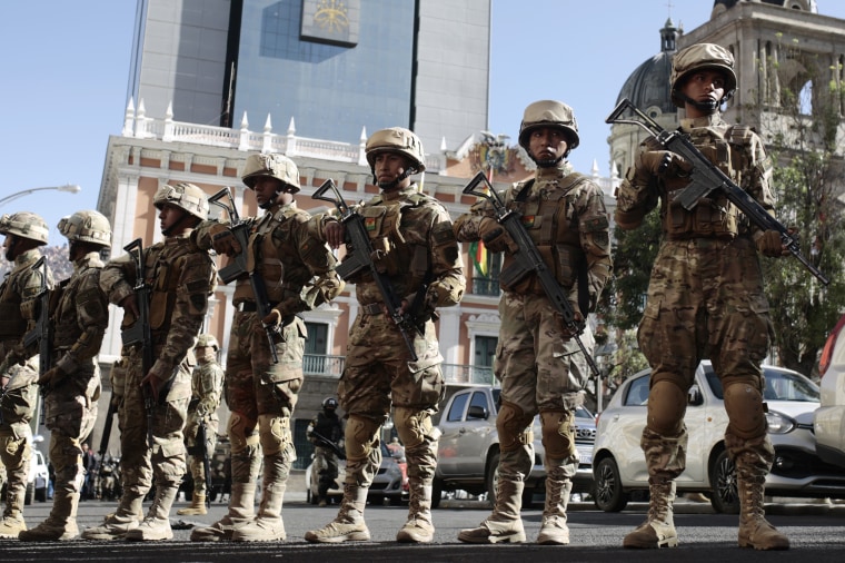 Military soldiers stand guard at Plaza Murillo in La Paz, Bolivia