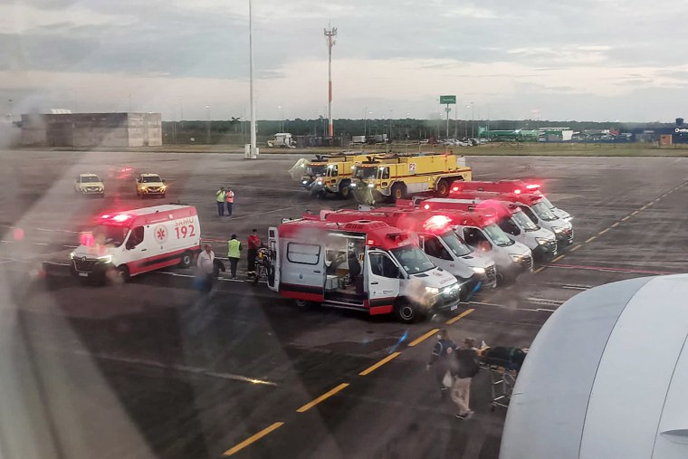 Ambulances next to an Air Europa Boeing 787-9 Dreamliner after it made an emergency landing in Natal, in northern Brazil, on July 1, 2024, after hitting strong turbulence on its way from Madrid to Montevideo. 