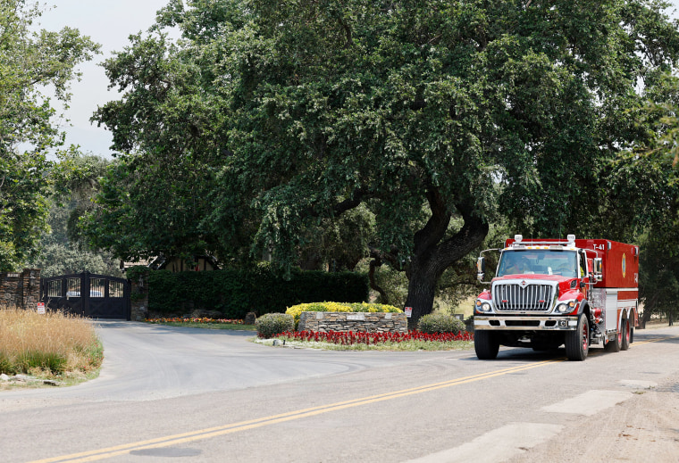 A fire truck is seen near the entrance 