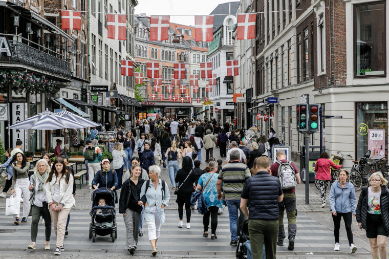 People are walking on a street in the center of Copenhagen,