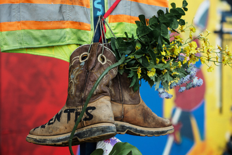 Boots on a memorial for Alejandro Hernandez