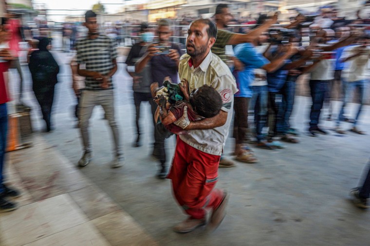 A deadly strike hit a school turned shelter in southern Gaza on July 9 as Israeli forces in the war-ravaged territory's main city pushed on with a major offensive that has again displaced Palestinians. 