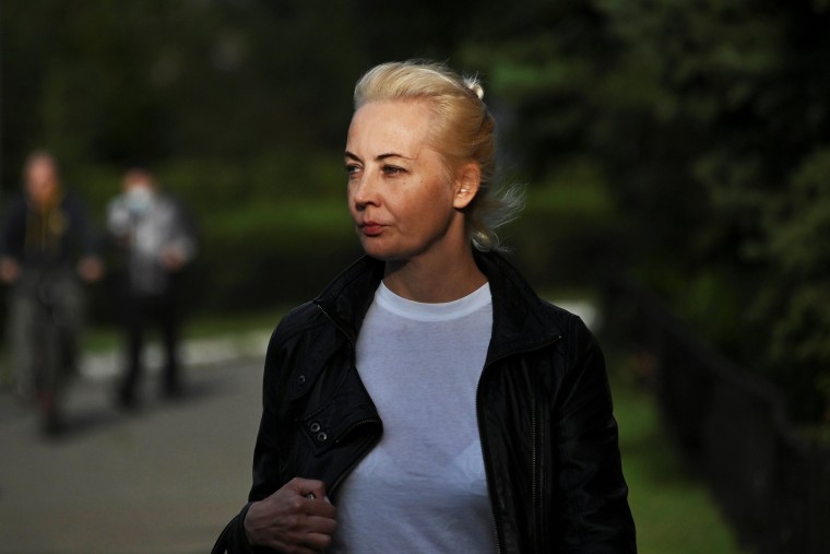 Image: Yulia Navalnaya, wife of Russian opposition leader Alexei Navalny, walks near a hospital in Omsk