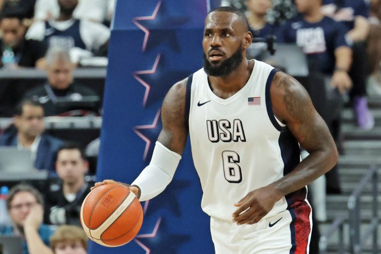 LeBron James of the U.S. plays against Canada in an exhibition game