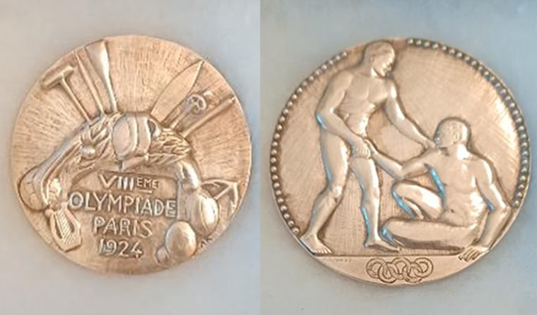 The Olympic medal won by Eugene Oberst in 1924.