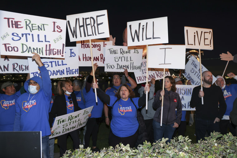 Rent control advocates protest outside the Apartment Association of Greater Los Angeles fundraiser on Jan. 25, 2023 in Long Beach, Calif. 