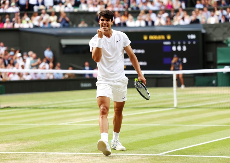 Carlos Alcaraz of Spain celebrates as he plays against Novak Djokovic of Serbia in the Wimbledon men's final on July 14, 2024.