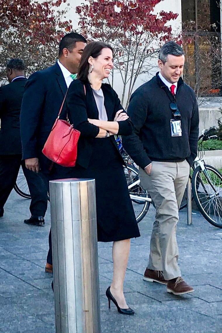 Assistant U.S. Attorney Jennifer Kerkhoff and MPD Detective Gregg Pemberton.