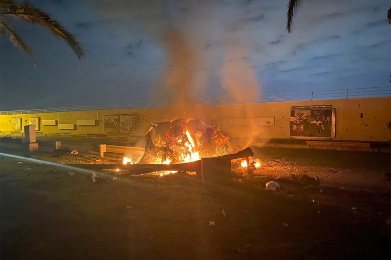 A destroyed car burns after the US strike on January 3, 2020 at Baghdad International Airport that killed top Iranian commander Qasem Soleimani and eight others.