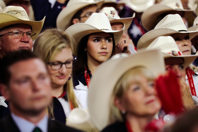 Attendees in cowboy hats