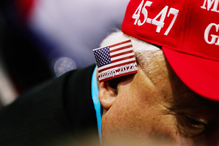 Numerous attendees wore bandages or other decorations on their ears in solidarity with Trump after the attempt on his life. 