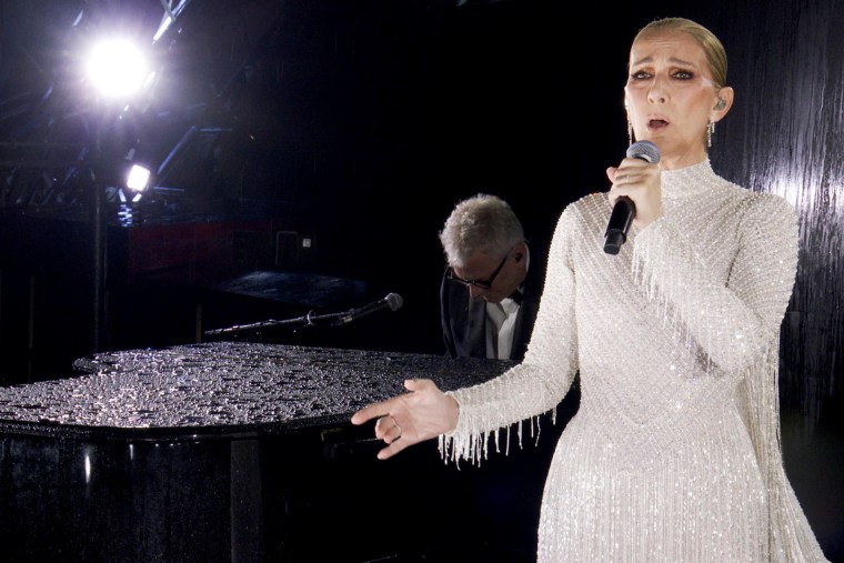Image: celine dion performs olympics opening day