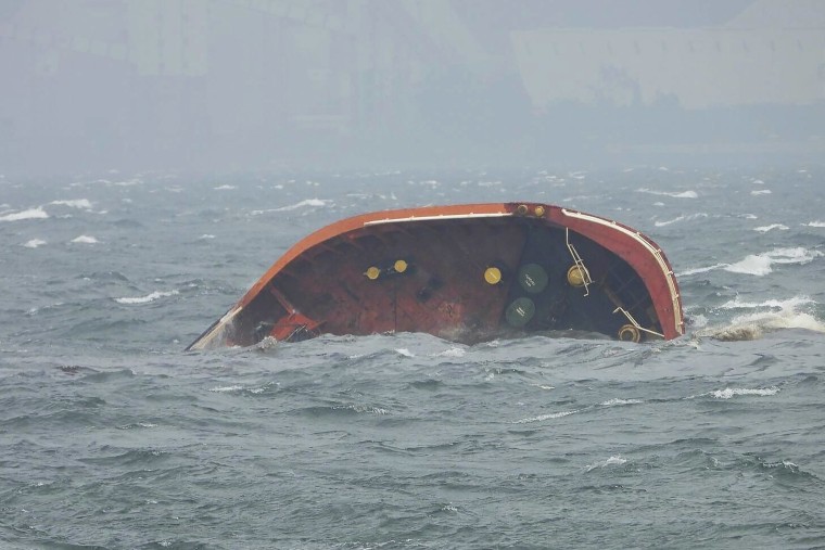 The oil tanker sank in Manila Bay early Thursday after encountering huge waves and the coast guard is now assessing the vessel for a leak that could cause a major spill that could reach the capital Manila, Philippine's coast guard said.