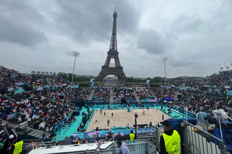 A view of the beach volleyball court under the Eiffel Tower. 