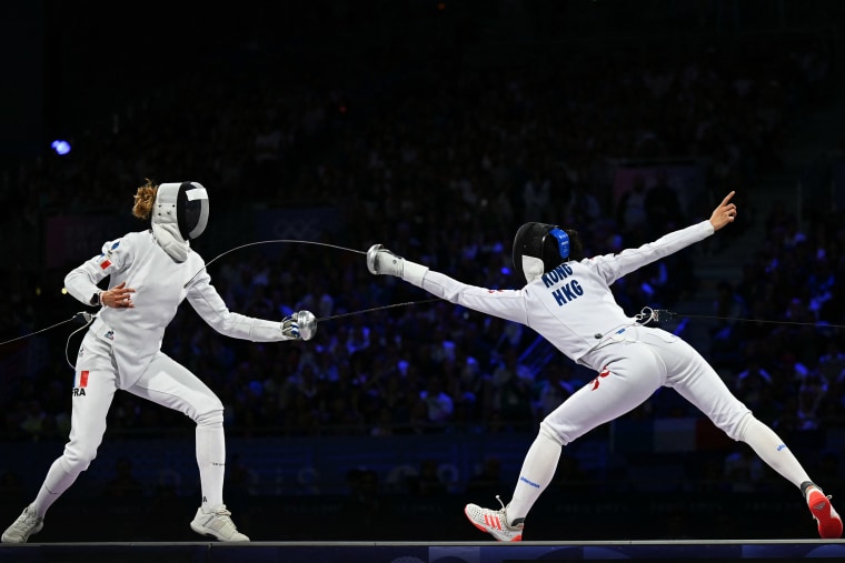 France's Auriane Mallo-Breton and Hong Kong's Kong Man Wai Vivian compete in the women's epee individual gold medal bout during the Paris 2024 Olympic Games.