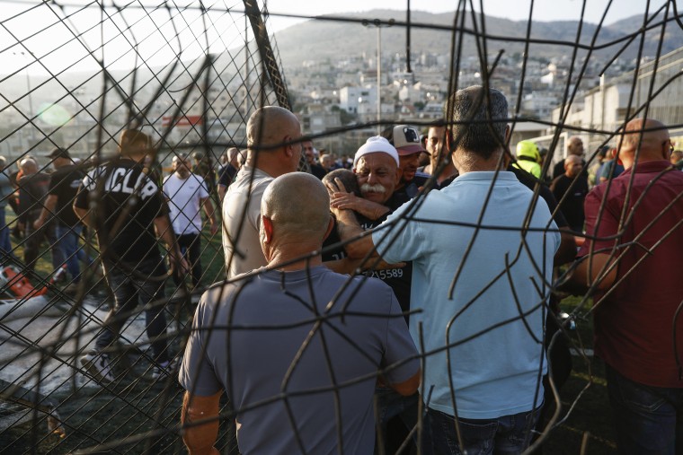 Israel's emergency medical service Magen David Adom said at least nine people were killed and 34 wounded including 17 in critical condition, after a rocket fired from Lebanon had hit the town of Majdal Shams in the Israeli-annexed Golan Heights.