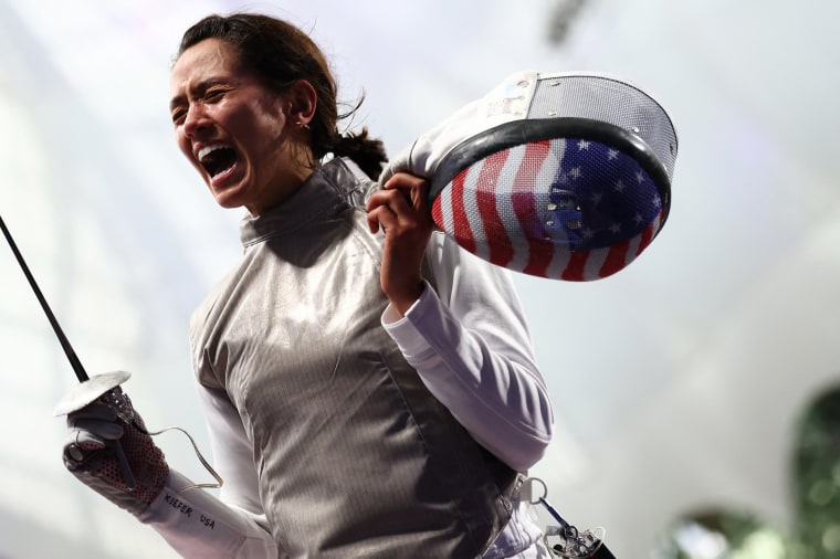 U.S. fencer Lee Kiefer celebrates after defeating China's Huang Qianqian at the Paris 2024 Olympic Games at the Grand Palais in Paris, on July 28, 2024. 