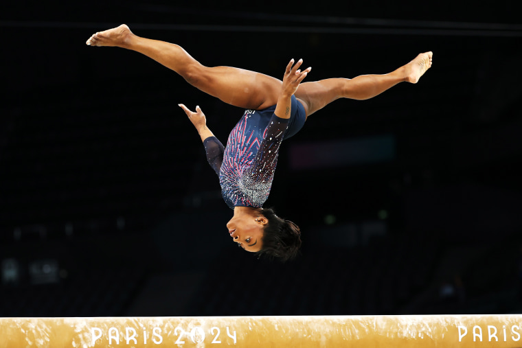 Simone Biles practices on the balance beam during a Gymnastics training session in the Bercy Arena ahead of the Paris 2024 Olympic Games on July 25, 2024 in Paris, France. 