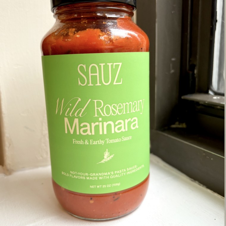 Sauz Wild Rosemary Marinara sits on top of a windowsill.