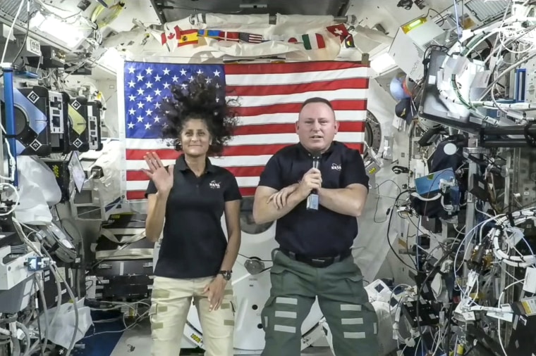 Image: Astronauts Suni Williams, left, and Butch Wilmore