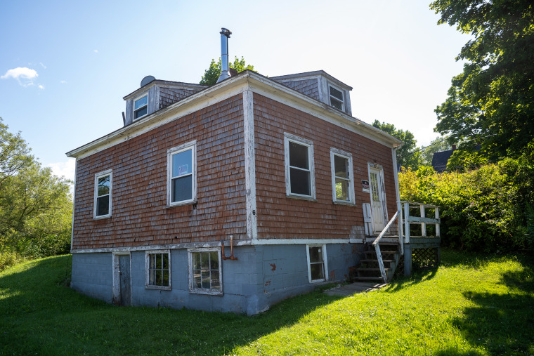 rockland maine vacationland no trespassing sign abandoned house